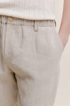 ELASTICATED WIDE TROUSERS